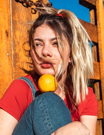 Woman In Red Shirt and Blue Denim Dungarees