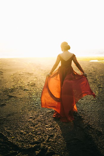 Woman In Red Sleeveless Dress