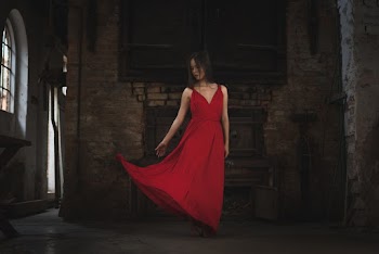 Woman in Red Thick Strap Dress