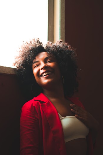 Woman in Red Top Smiling