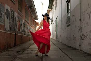 Woman in Red V-neck Sleeveless Dress