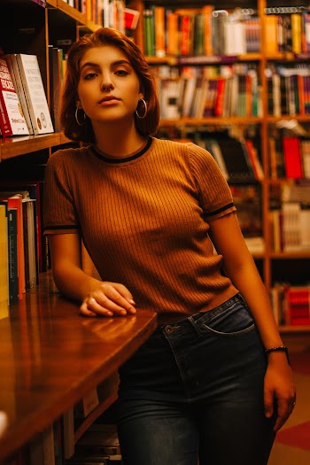 Woman in Standing Library