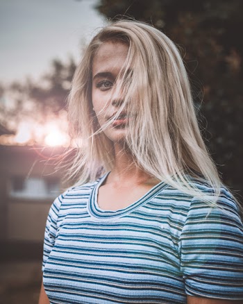 Woman In Striped Scoop-neck T-shirt
