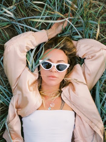 Woman in Sunglasses Lying in Grass · Free Stock Photo