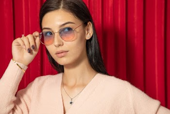 Woman in Sunglasses Wearing Beige Top