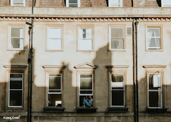 Woman in the window of her apartment during self quarantine due to the.. | Free  photo - 2332454