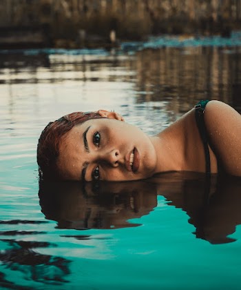 Woman in Water Wearing Brassiere