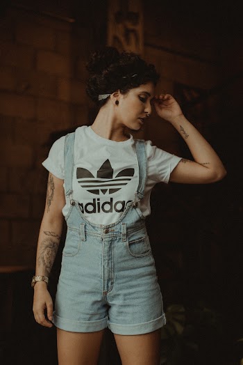 Woman In White Adidas Shirt