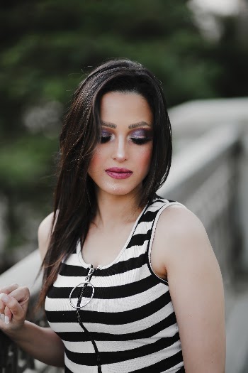 Woman in White and Black Striped Tank Top