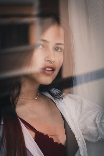Woman in White and Black Top on Selective Focus Photography
