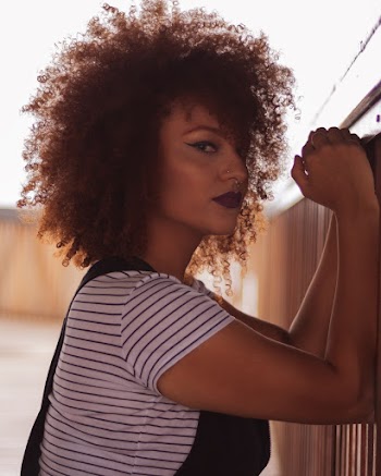 Woman in White and Grey Stripe T-shirt