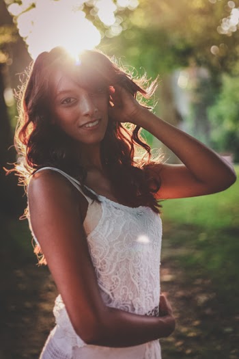 Woman In White Camisole
