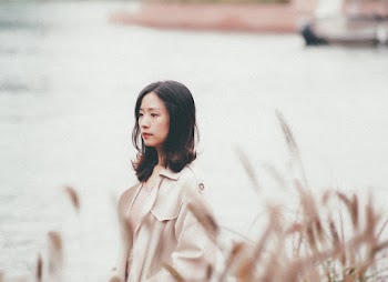 Woman in White Coat