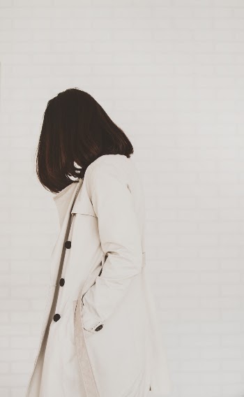 Woman in White Coat on a white background