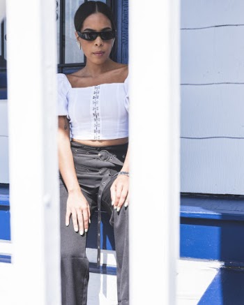Woman in White Crop Top