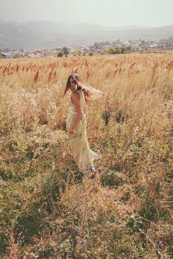 woman in white dress on green green field