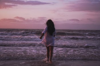 Woman in White Dress Standing on Beach · Free Stock Photo