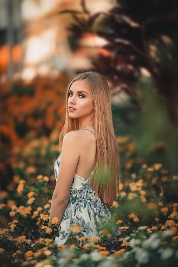 Woman in White Floral Dress