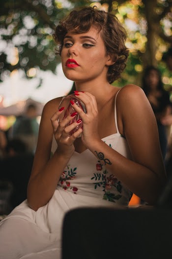 Woman in White Floral Dress