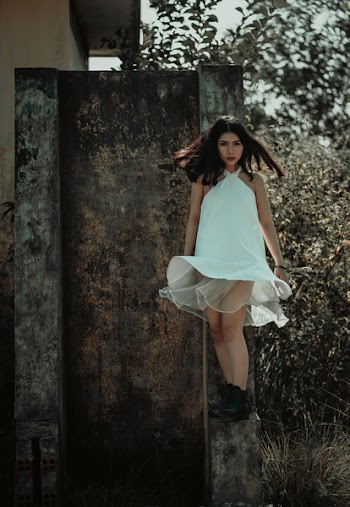 Woman in White Halter Dress