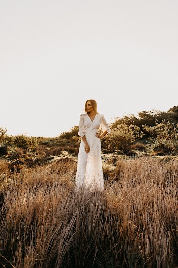Woman in White Jumpsuit