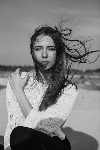 Woman in White Knit Sweater