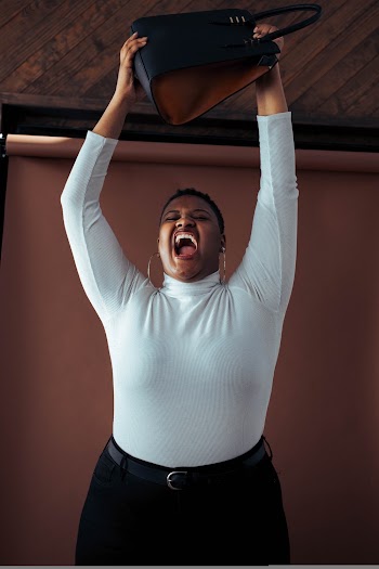 Woman in White Long Sleeve Shirt and Black Pants