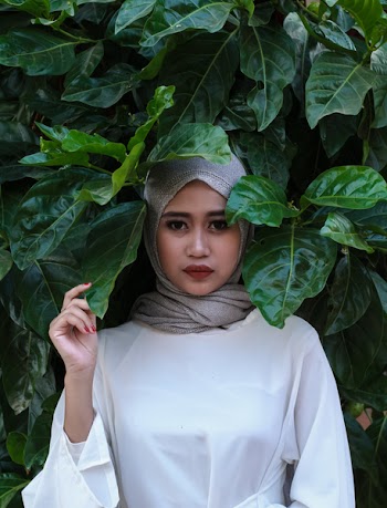 Woman In White Long-sleeved Dress