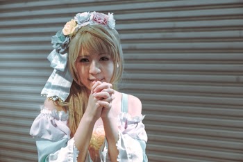 Woman in White Off Shoulder Shirt With Flower Crown