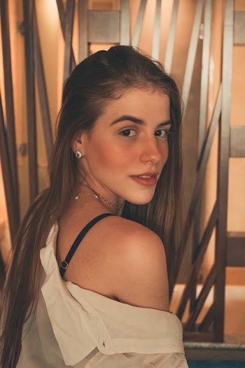 Woman in White Off-shoulder Top