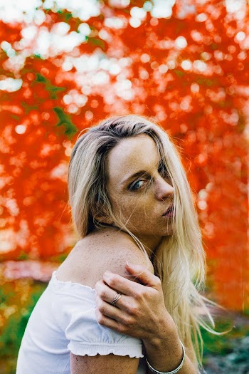 Woman In White Off-shoulder Top On Selective Focus Photo