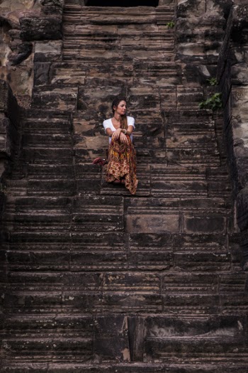 Woman in White Scoop-neck Shirt ]And Brown Skirt