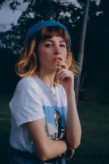 Woman in White Shirt