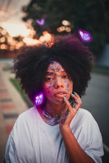 Woman in White Shirt with Glitters on her Face · Free Stock Photo