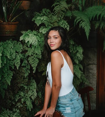 Woman In White Sleeveless Top
