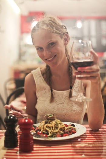 Woman in White Sleeveless Tops Holding Wine Glass