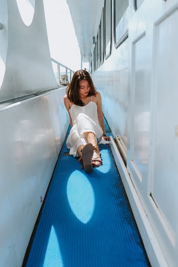 Woman In White Spaghetti Strap Dress
