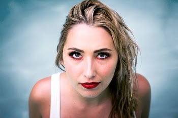 woman in white tank top