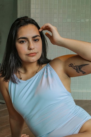 Woman in White Tank Top