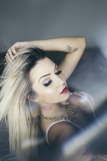 Woman in White Top