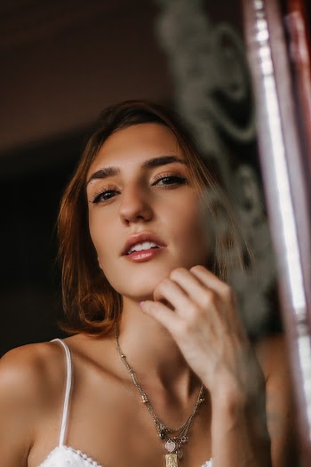Woman in White Top