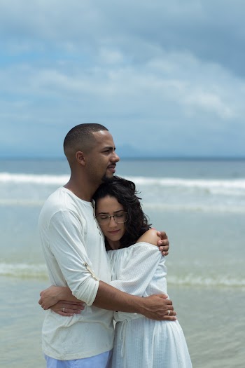 Woman in White Top and Man in White Top
