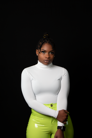 Woman in White Turtleneck Sweater