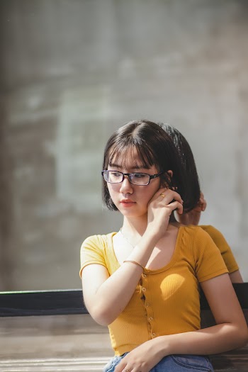 Woman in Yellow Button-up Short-sleeved Shirt
