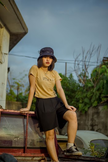 Woman in Yellow Crew Neck T-shirt and Black Shorts