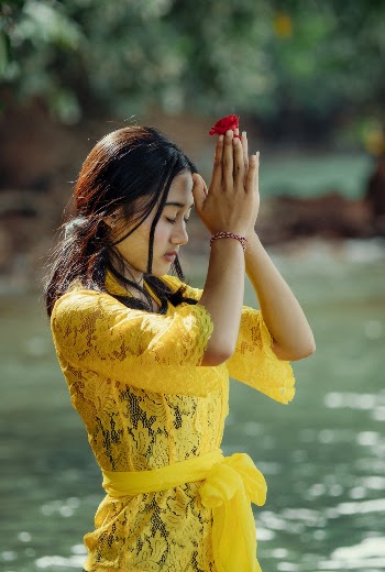 Woman in Yellow Dress Meditating