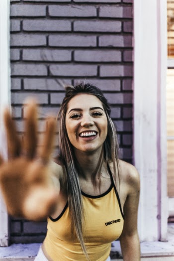 Woman In Yellow Halter Top