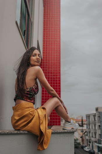 Woman in Yellow Mini Skirt
