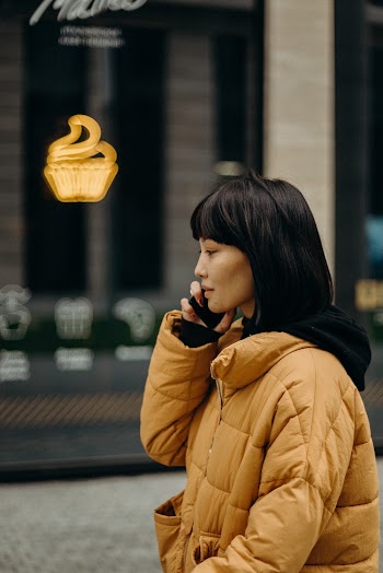 Woman in Yellow Puffer Jacket