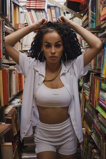 Woman Inside A Library  